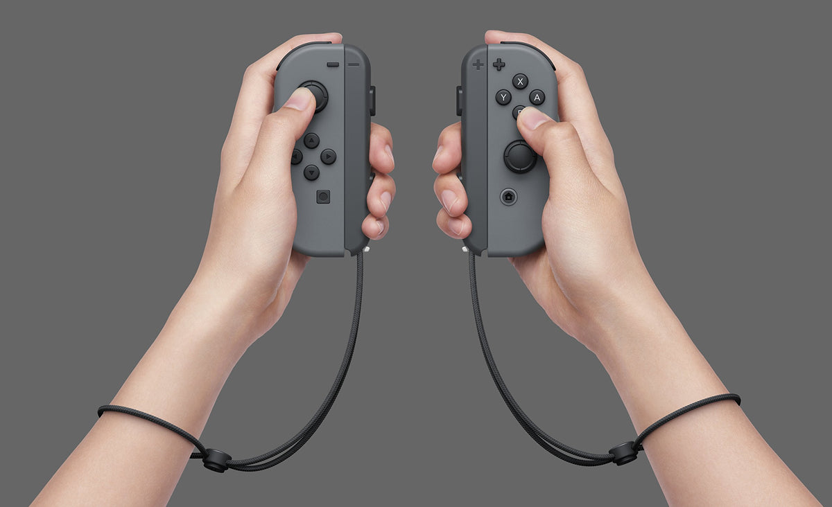 Nintendo Switch Game Console - Black (HAC-001(-01) w/ OEM Gray Joy Cons (Renewed)